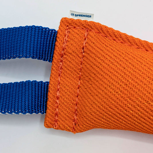Heavy-duty cotton orange bite tug for obedience, reward training, and bite development, with reinforced handles for control.