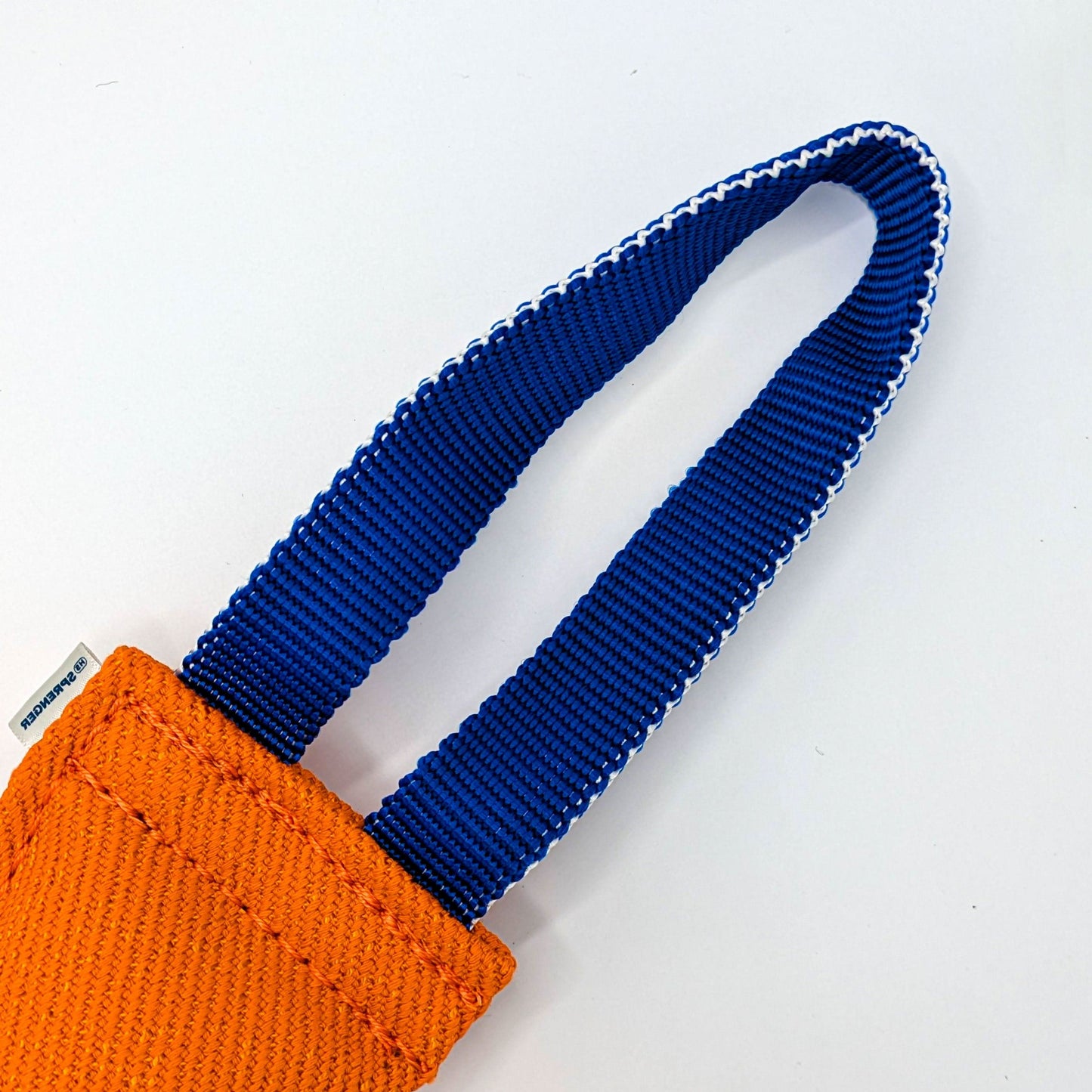 Heavy-duty cotton orange bite tug for obedience, reward training, and bite development, with reinforced handles for control.