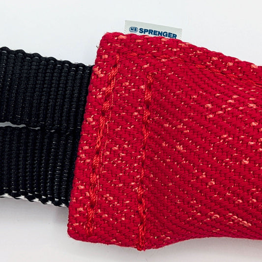 Durable cotton red bite tug for obedience, reward training, and early bitework, with dual handles for easy grip and control.