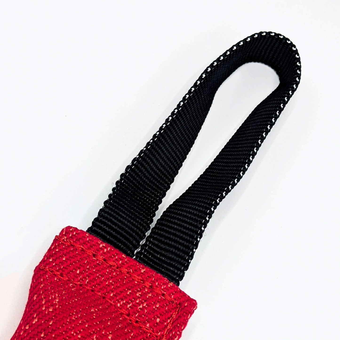 Durable cotton red bite tug for obedience, reward training, and early bitework, with dual handles for easy grip and control.