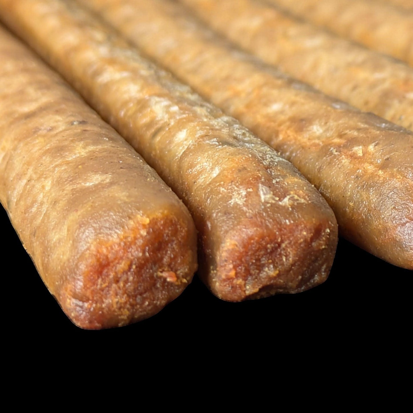 Top Tier Pure Meat Sticks – 100% venison, salmon, or haddock for high-protein, grain-free, easy-to-digest treats that support health.