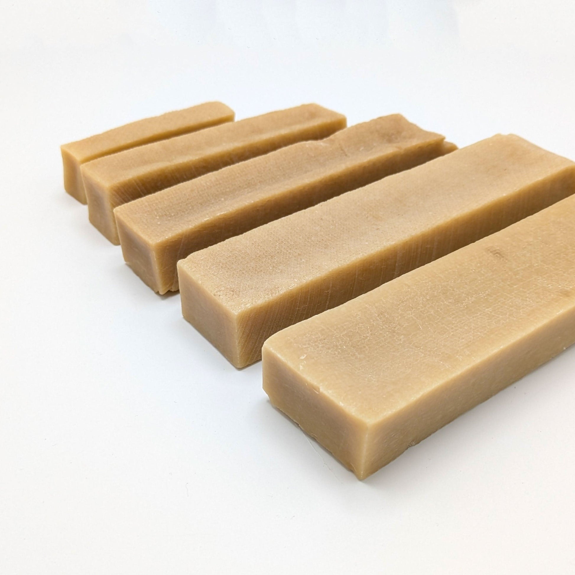 Top Tier Yak Chews – Long-lasting, high-protein chews for dental health. Available in multiple sizes for all breeds.