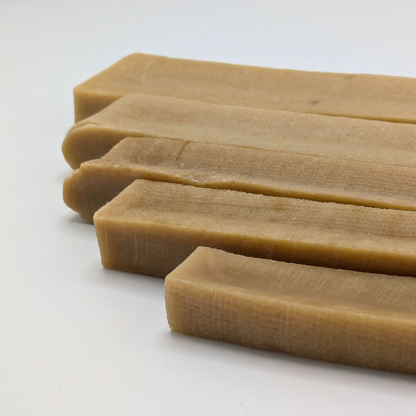 Top Tier Yak Chews – Long-lasting, high-protein chews for dental health. Available in multiple sizes for all breeds.